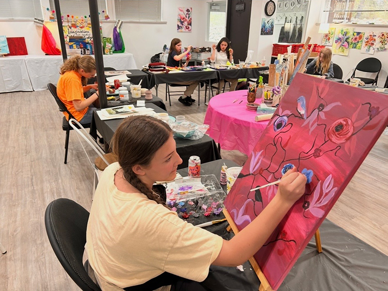 Closeup of student painting