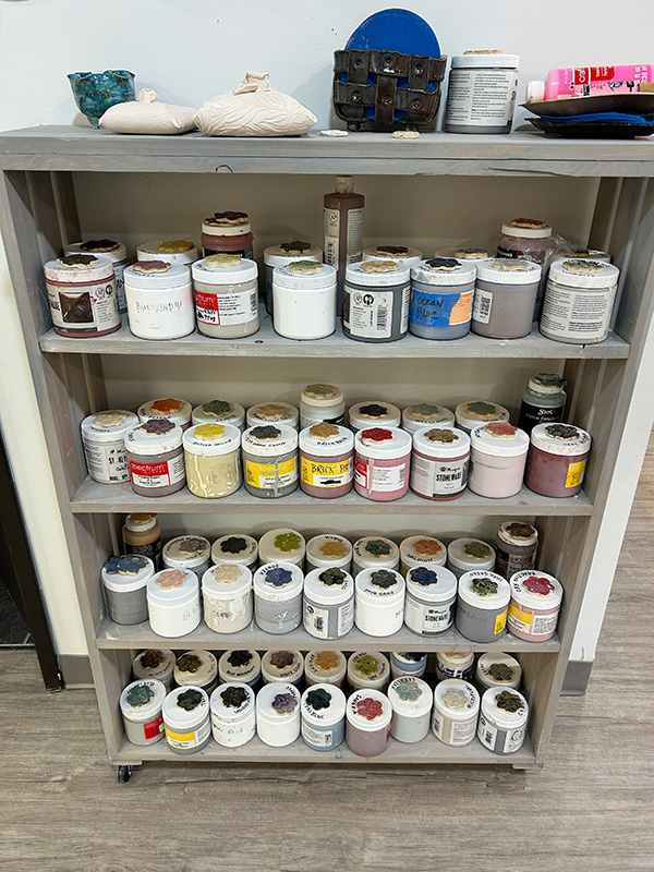Paints on shelves
